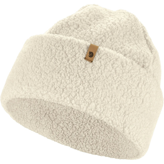 Beige fleece-lined beanie with a brand logo on a white background